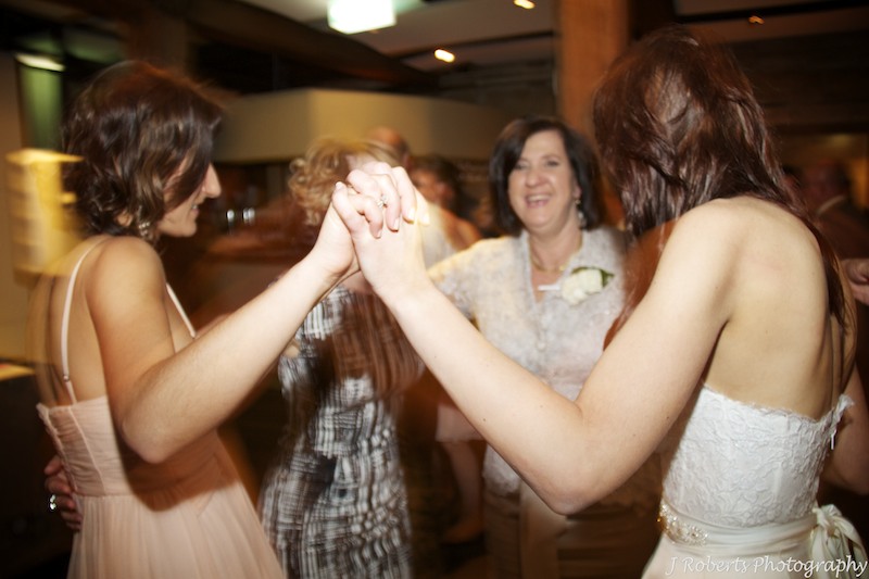 Bride dancing with her family - wedding photography sydney